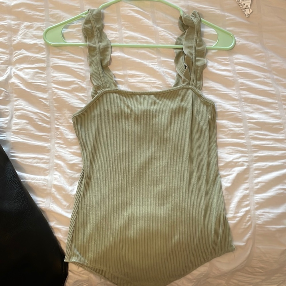Light green ribbed bodysuit.